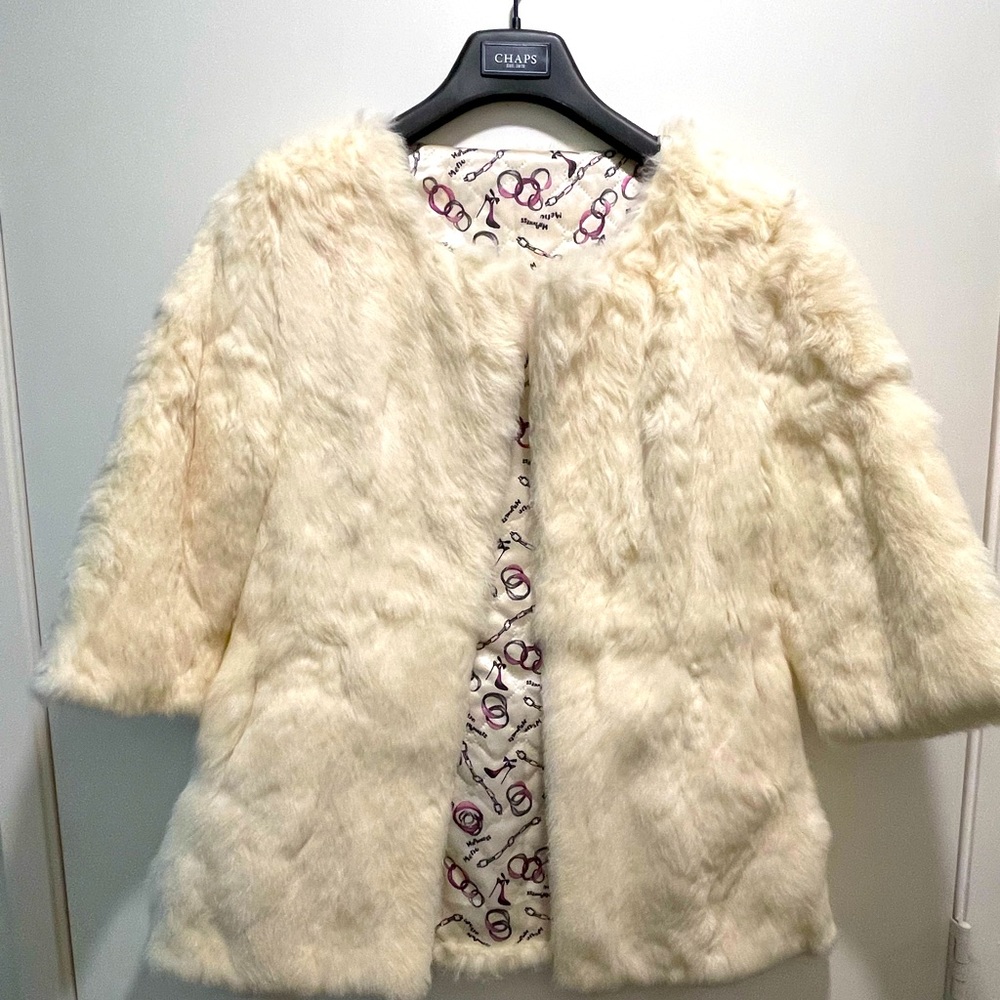 Cream rabbit fur with beautiful silky liner.